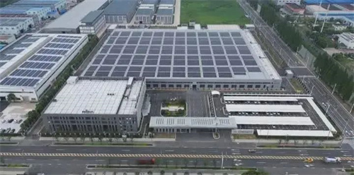 仪征亚新科建成年产百万套空压机产能(图1)